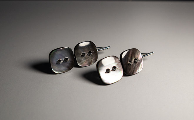 Shell button earrings.